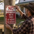 NO  TRESPASSING  WE'RE  TIRED  OF HIDING  THE BODIES